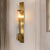 Contemporary 1 Bulb Wall Lighting Gold Tube Sconce Light Fixture with Clear Glass Shade Gold Clearhalo 'Cast Iron' 'Glass' 'Industrial' 'Modern wall lights' 'Modern' 'Tiffany' 'Traditional wall lights' 'Wall Lamps & Sconces' 'Wall Lights' Lighting' 331211