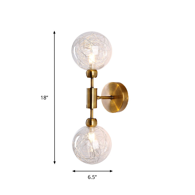 1/2-Light Bedroom Sconce Wall Light Industrial Style Black/Brass Finish Wall Lamp with Orbit Clear Glass Shade Clearhalo 'Art deco wall lights' 'Cast Iron' 'Glass' 'Industrial wall lights' 'Industrial' 'Middle century wall lights' 'Modern' 'Rustic wall lights' 'Tiffany' 'Traditional wall lights' 'Wall Lamps & Sconces' 'Wall Lights' Lighting' 331683