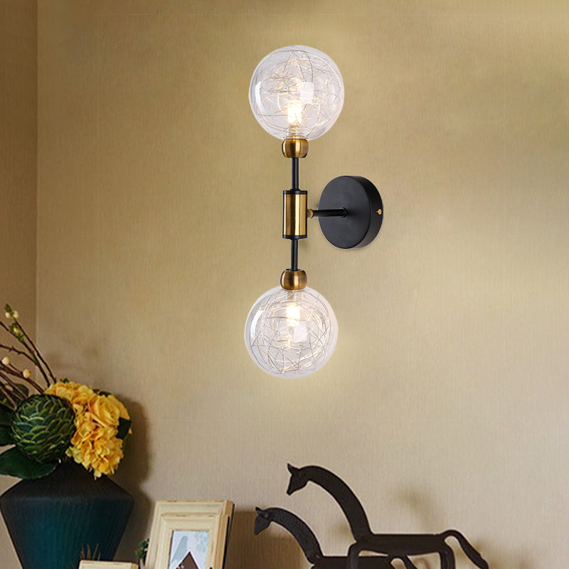 1/2-Light Bedroom Sconce Wall Light Industrial Style Black/Brass Finish Wall Lamp with Orbit Clear Glass Shade Clearhalo 'Art deco wall lights' 'Cast Iron' 'Glass' 'Industrial wall lights' 'Industrial' 'Middle century wall lights' 'Modern' 'Rustic wall lights' 'Tiffany' 'Traditional wall lights' 'Wall Lamps & Sconces' 'Wall Lights' Lighting' 331685