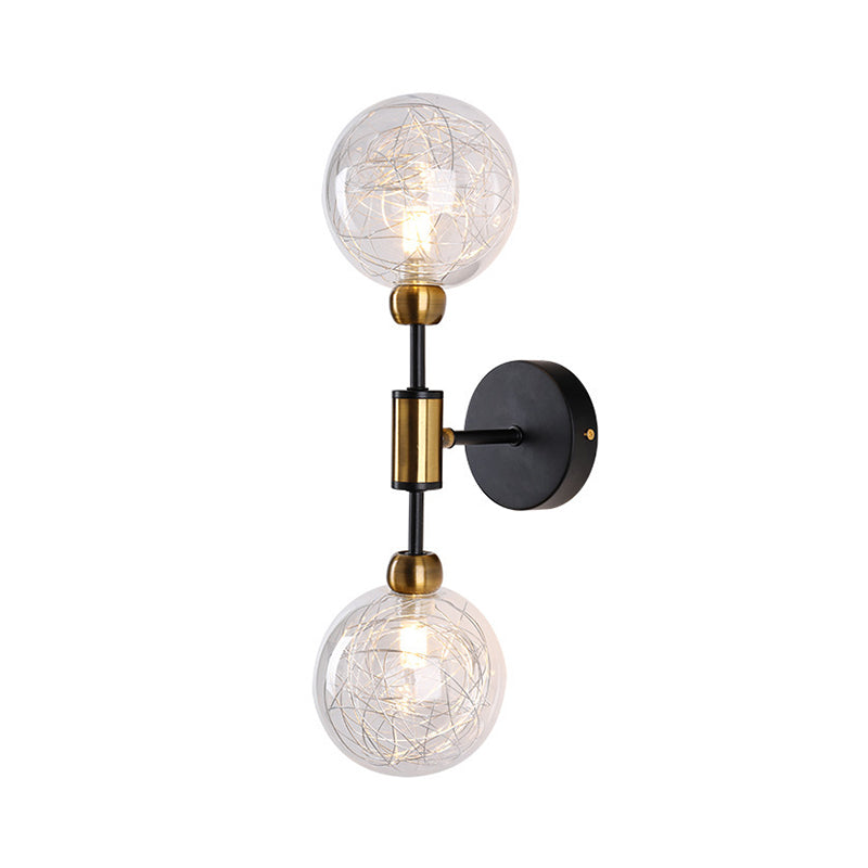 1/2-Light Bedroom Sconce Wall Light Industrial Style Black/Brass Finish Wall Lamp with Orbit Clear Glass Shade Clearhalo 'Art deco wall lights' 'Cast Iron' 'Glass' 'Industrial wall lights' 'Industrial' 'Middle century wall lights' 'Modern' 'Rustic wall lights' 'Tiffany' 'Traditional wall lights' 'Wall Lamps & Sconces' 'Wall Lights' Lighting' 331686