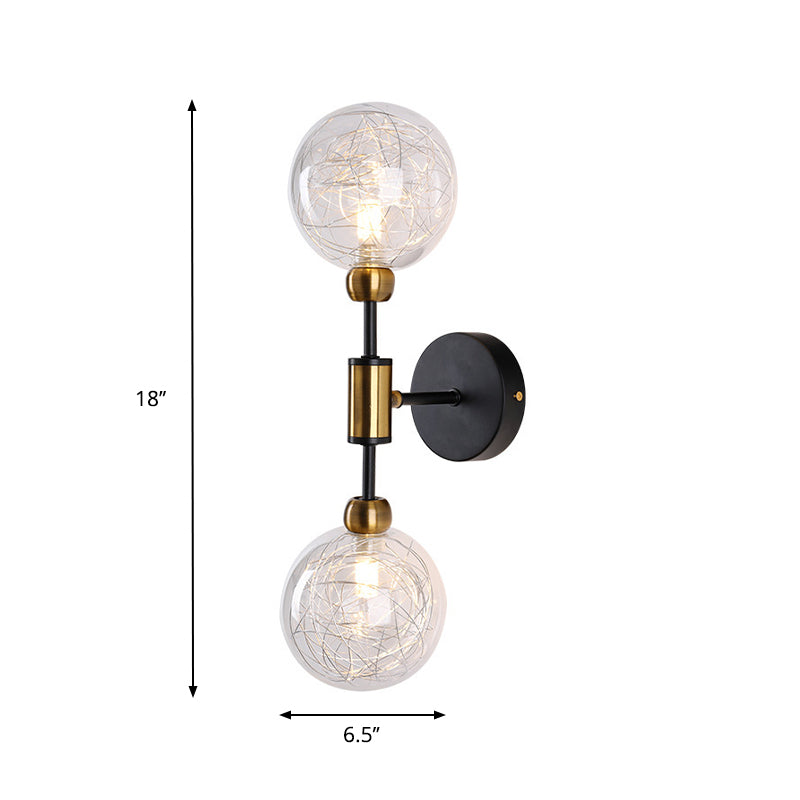1/2-Light Bedroom Sconce Wall Light Industrial Style Black/Brass Finish Wall Lamp with Orbit Clear Glass Shade Clearhalo 'Art deco wall lights' 'Cast Iron' 'Glass' 'Industrial wall lights' 'Industrial' 'Middle century wall lights' 'Modern' 'Rustic wall lights' 'Tiffany' 'Traditional wall lights' 'Wall Lamps & Sconces' 'Wall Lights' Lighting' 331687