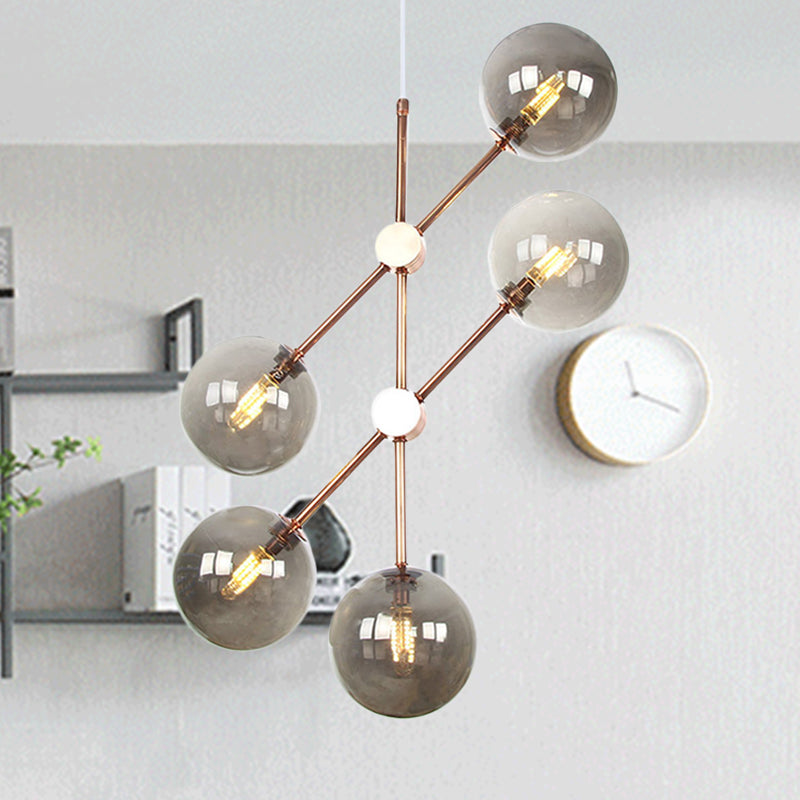 Modernist Global Hanging Ceiling Lamp Amber/Smoke Gray Glass 5 Bulbs Living Room LED Chandelier Lamp Smoke Gray Clearhalo 'Ceiling Lights' 'Chandeliers' 'Glass shade' 'Glass' 'Modern Chandeliers' 'Modern' Lighting' 331751