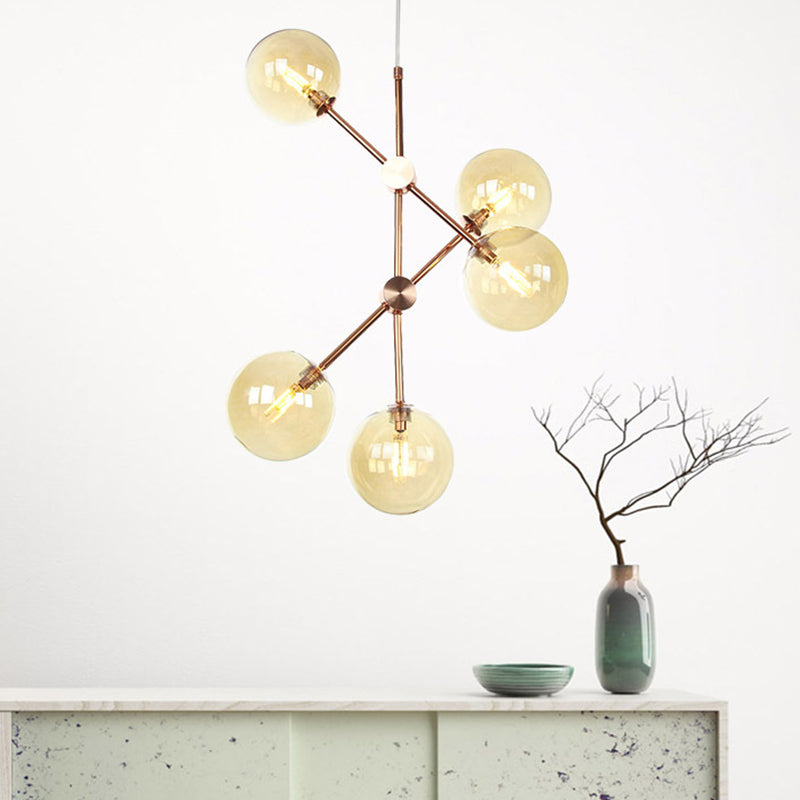 Modernist Global Hanging Ceiling Lamp Amber/Smoke Gray Glass 5 Bulbs Living Room LED Chandelier Lamp Amber Clearhalo 'Ceiling Lights' 'Chandeliers' 'Glass shade' 'Glass' 'Modern Chandeliers' 'Modern' Lighting' 331756