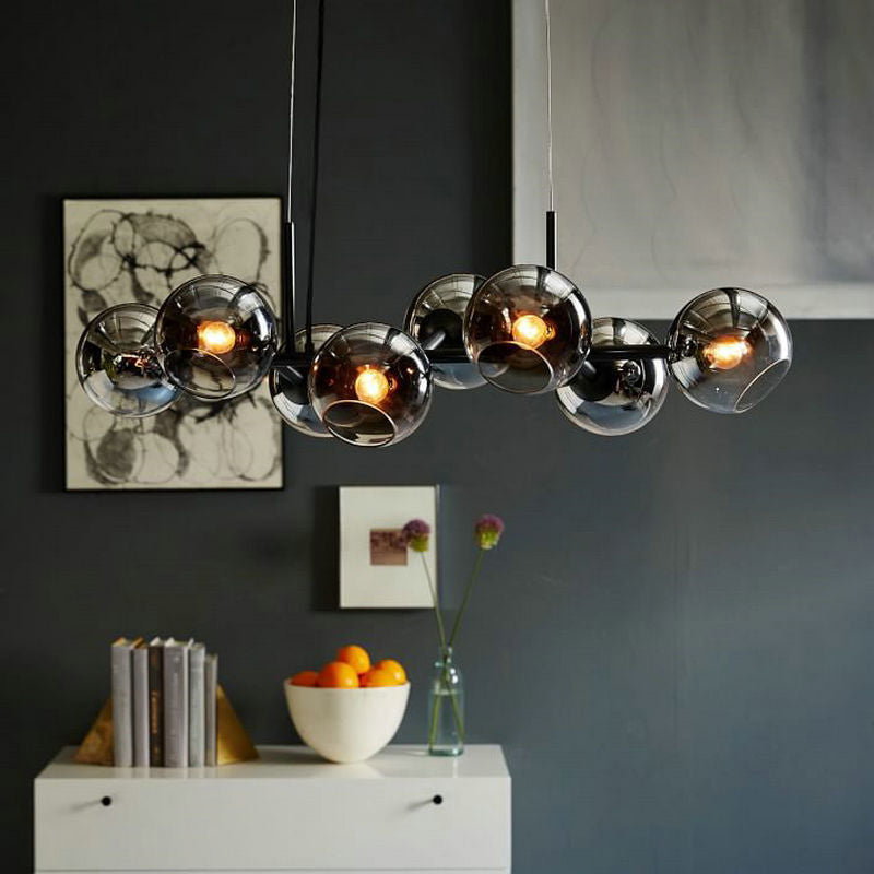 8 Bulbs Ball Island Lamp Contemporary Clear/Smoke Glass Suspended Lighting Fixture in Black/Gold for Dining Room Black Smoke Grey Clearhalo 'Ceiling Lights' 'Chandeliers' 'Close To Ceiling Lights' 'Glass shade' 'Glass' 'Island Lights' Lighting' 342748