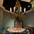 Candlestick Metal Chandelier Light Industrial 8 Heads Restaurant LED Down Lighting in Black with Flower Decor Black Clearhalo 'Cast Iron' 'Ceiling Lights' 'Chandeliers' 'Industrial Chandeliers' 'Industrial' 'Metal' 'Middle Century Chandeliers' 'Rustic Chandeliers' 'Tiffany' Lighting' 367697