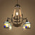 Pipe Hanging Chandelier with Gear Rustic Lodge Multi Light Stained Glass Suspension Light with Star/House Shape Antique Bronze House Clearhalo 'Ceiling Lights' 'Chandeliers' 'Industrial' 'Middle Century Chandeliers' 'Tiffany Chandeliers' 'Tiffany close to ceiling' 'Tiffany' Lighting' 36880
