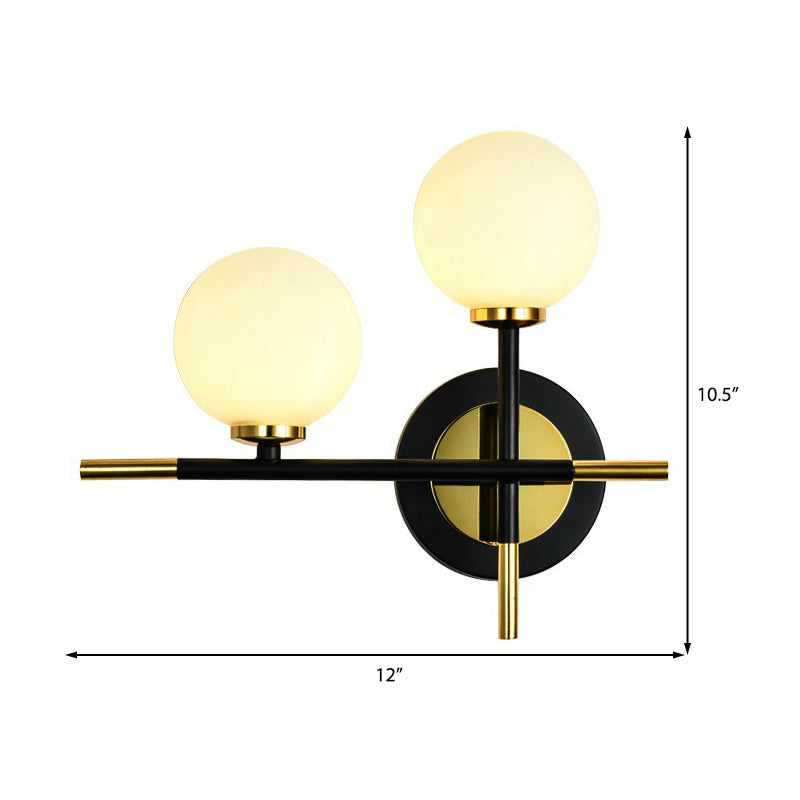Milk Glass Orb Sconce Light with Cross Design 2 Lights Modern Black and Brass Wall Light Clearhalo 'Cast Iron' 'Glass' 'Industrial' 'Modern wall lights' 'Modern' 'Tiffany' 'Traditional wall lights' 'Vanity Lights' 'Wall Lights' Lighting' 370193
