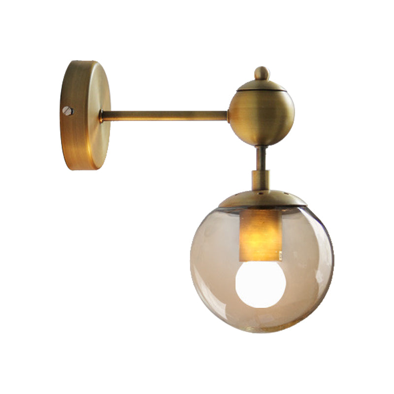 1/2-Head Global Wall Mount Light with Amber Glass Shade Modernist Wall Sconce Lighting in Gold for Bedroom Clearhalo 'Cast Iron' 'Glass' 'Industrial' 'Modern wall lights' 'Modern' 'Tiffany' 'Traditional wall lights' 'Vanity Lights' 'Wall Lights' Lighting' 370203
