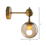 1/2-Head Global Wall Mount Light with Amber Glass Shade Modernist Wall Sconce Lighting in Gold for Bedroom Clearhalo 'Cast Iron' 'Glass' 'Industrial' 'Modern wall lights' 'Modern' 'Tiffany' 'Traditional wall lights' 'Vanity Lights' 'Wall Lights' Lighting' 370204
