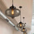 Industrial Onion Shade Pendant Lighting 1 Light Red/Yellow/Smoke Gray Glass Hanging Lamp for Bar Smoke Gray Clearhalo 'Art Deco Pendants' 'Cast Iron' 'Ceiling Lights' 'Ceramic' 'Crystal' 'Industrial Pendants' 'Industrial' 'Metal' 'Middle Century Pendants' 'Pendant Lights' 'Pendants' 'Tiffany' Lighting' 381138