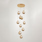 10 Bulbs Amber Dimpled Glass Pendant Contemporary Gold Ball Living Room Multi Light Chandelier Clearhalo 'Ceiling Lights' 'Modern Pendants' 'Modern' 'Pendant Lights' 'Pendants' Lighting' 398930