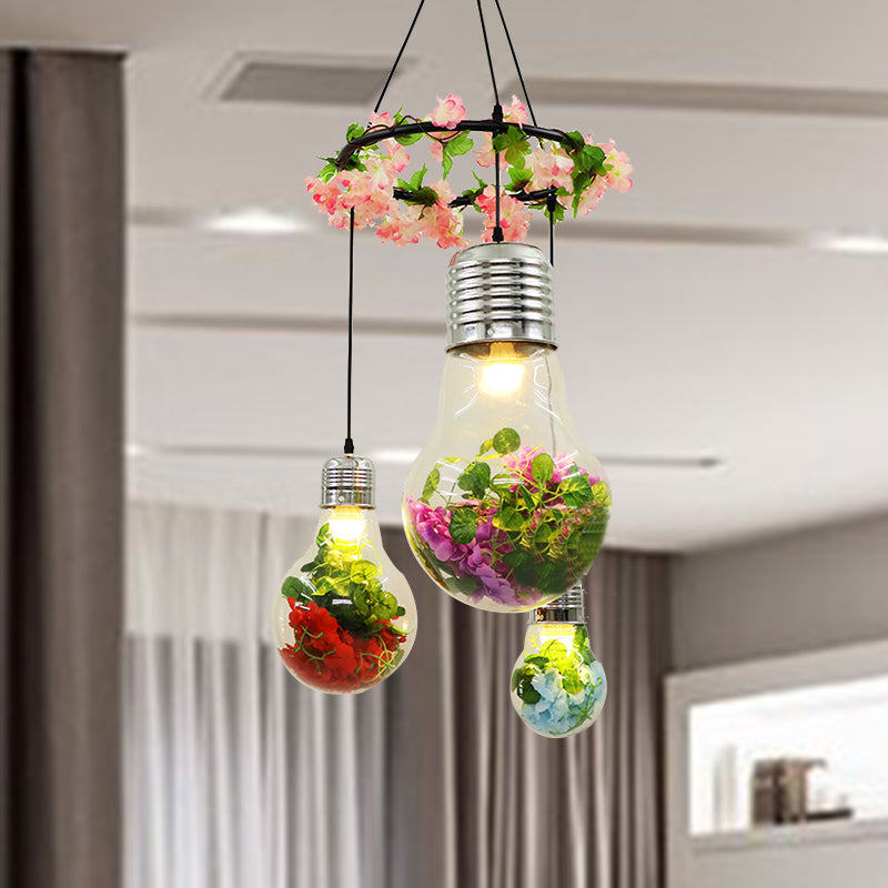 Clear Glass Bulb Cluster Pendant Industrial 3 Lights Restaurant LED Ceiling Lamp in Black with Flower Decoration Clearhalo 'Ceiling Lights' 'Glass shade' 'Glass' 'Industrial Pendants' 'Industrial' 'Middle Century Pendants' 'Pendant Lights' 'Pendants' 'Tiffany' Lighting' 400991