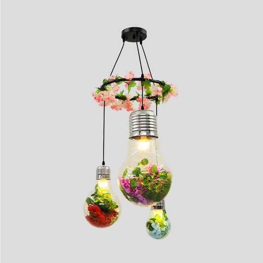 Clear Glass Bulb Cluster Pendant Industrial 3 Lights Restaurant LED Ceiling Lamp in Black with Flower Decoration Clearhalo 'Ceiling Lights' 'Glass shade' 'Glass' 'Industrial Pendants' 'Industrial' 'Middle Century Pendants' 'Pendant Lights' 'Pendants' 'Tiffany' Lighting' 400993