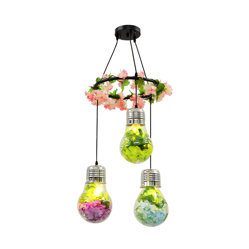 Clear Glass Bulb Cluster Pendant Industrial 3 Lights Restaurant LED Ceiling Lamp in Black with Flower Decoration Clearhalo 'Ceiling Lights' 'Glass shade' 'Glass' 'Industrial Pendants' 'Industrial' 'Middle Century Pendants' 'Pendant Lights' 'Pendants' 'Tiffany' Lighting' 400997