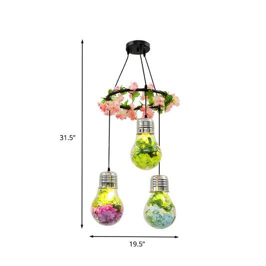 Clear Glass Bulb Cluster Pendant Industrial 3 Lights Restaurant LED Ceiling Lamp in Black with Flower Decoration Clearhalo 'Ceiling Lights' 'Glass shade' 'Glass' 'Industrial Pendants' 'Industrial' 'Middle Century Pendants' 'Pendant Lights' 'Pendants' 'Tiffany' Lighting' 400998
