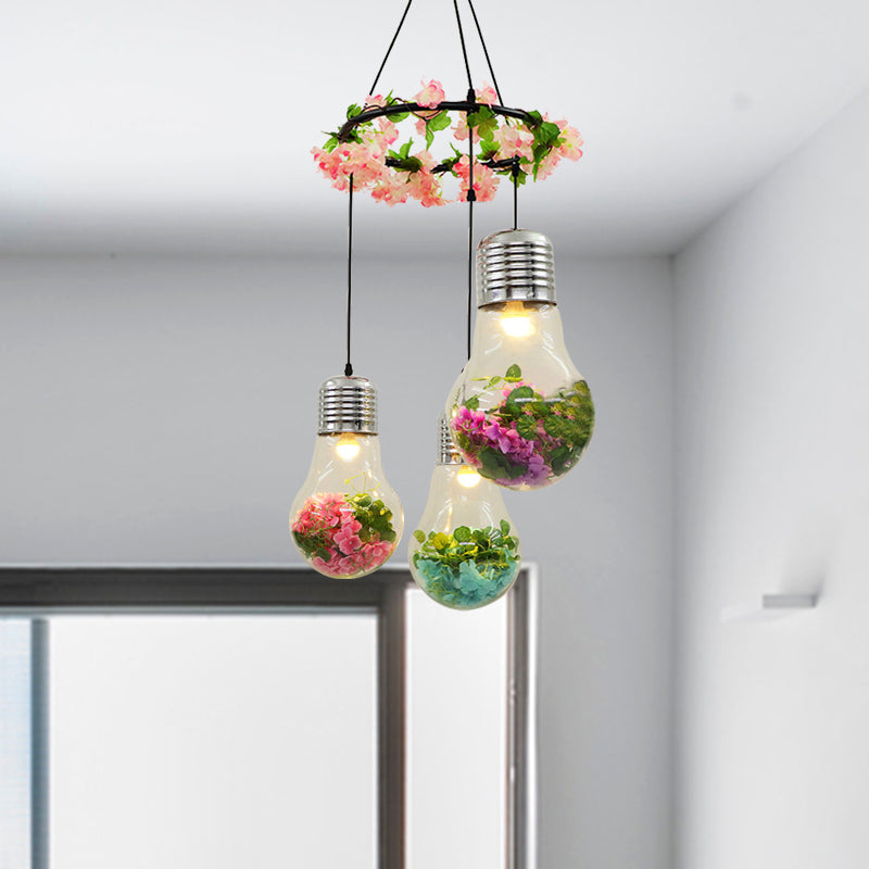 Clear Glass Bulb Cluster Pendant Industrial 3 Lights Restaurant LED Ceiling Lamp in Black with Flower Decoration Clearhalo 'Ceiling Lights' 'Glass shade' 'Glass' 'Industrial Pendants' 'Industrial' 'Middle Century Pendants' 'Pendant Lights' 'Pendants' 'Tiffany' Lighting' 401000