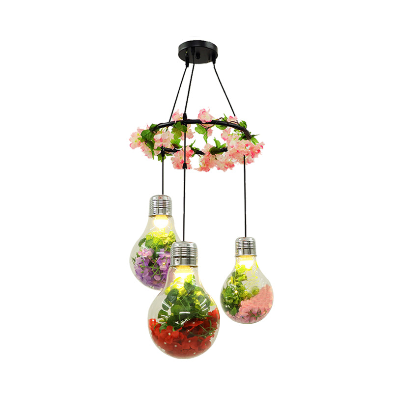 Clear Glass Bulb Cluster Pendant Industrial 3 Lights Restaurant LED Ceiling Lamp in Black with Flower Decoration Clearhalo 'Ceiling Lights' 'Glass shade' 'Glass' 'Industrial Pendants' 'Industrial' 'Middle Century Pendants' 'Pendant Lights' 'Pendants' 'Tiffany' Lighting' 401005
