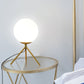 Opal Glass Sphere Desk Light Modern 1 Bulb Night Table Lamp in Gold/Black with Metal Tripod Clearhalo 'Lamps' 'Table Lamps' Lighting' 402346