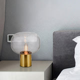 Minimalist 1-Bulb Nightstand Lamp Gold Oval Metal Table Lighting with Smoke Gray Glass Shade Gold Clearhalo 'Lamps' 'Table Lamps' Lighting' 410221