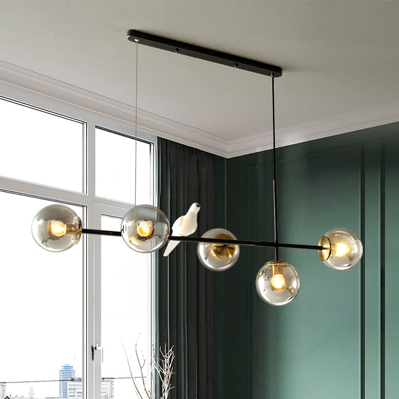 Industrial 5-Light Island Pendant with Amber/Milky White/Smoke Grey Glass Shade Brass Sphere Ceiling Light with Adjustable Cord Clearhalo 'Ceiling Lights' 'Close To Ceiling Lights' 'Glass shade' 'Glass' 'Island Lights' Lighting' 438697