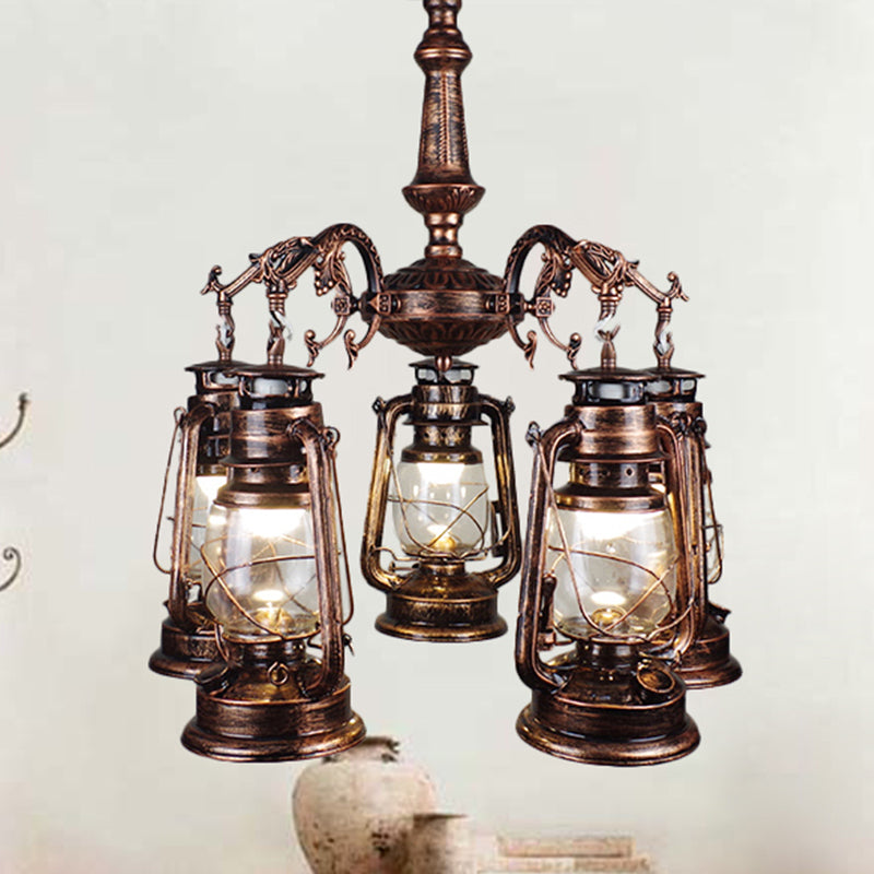 5 Lights Clear Glass Pendant Chandelier Antique Stylish Bronze/Copper Kerosene Dining Room Hanging Ceiling Fixture Clearhalo 'Cast Iron' 'Ceiling Lights' 'Chandeliers' 'Industrial Chandeliers' 'Industrial' 'Metal' 'Middle Century Chandeliers' 'Rustic Chandeliers' 'Tiffany' Lighting' 438842