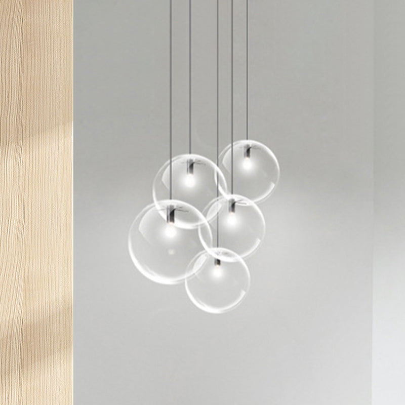 6"/8"/12" Wide Orb Pendant Lighting Contemporary 1 Light Clear Glass Hanging Ceiling Light in Black for Living Room Clearhalo 'Ceiling Lights' 'Glass shade' 'Glass' 'Industrial Pendants' 'Industrial' 'Middle Century Pendants' 'Pendant Lights' 'Pendants' 'Tiffany' Lighting' 438966