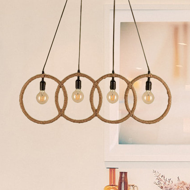 Black Finish Four-Ring Ceiling Pendant Lodge Style Manila Rope 4 Lights Coffee Shop Hanging Light Clearhalo 'Ceiling Lights' 'Industrial Pendants' 'Industrial' 'Middle Century Pendants' 'Pendant Lights' 'Pendants' 'Tiffany' Lighting' 456404