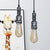 1 Light Bare Bulb Hanging Light Rustic Style Black/Silver Wrought Iron Ceiling Fixture with Pipe for Bathroom Silver Clearhalo 'Art Deco Pendants' 'Black' 'Cast Iron' 'Ceiling Lights' 'Ceramic' 'Crystal' 'Industrial Pendants' 'Industrial' 'Metal' 'Middle Century Pendants' 'Pendant Lights' 'Pendants' 'Rustic Pendants' 'Tiffany' Lighting' 456821