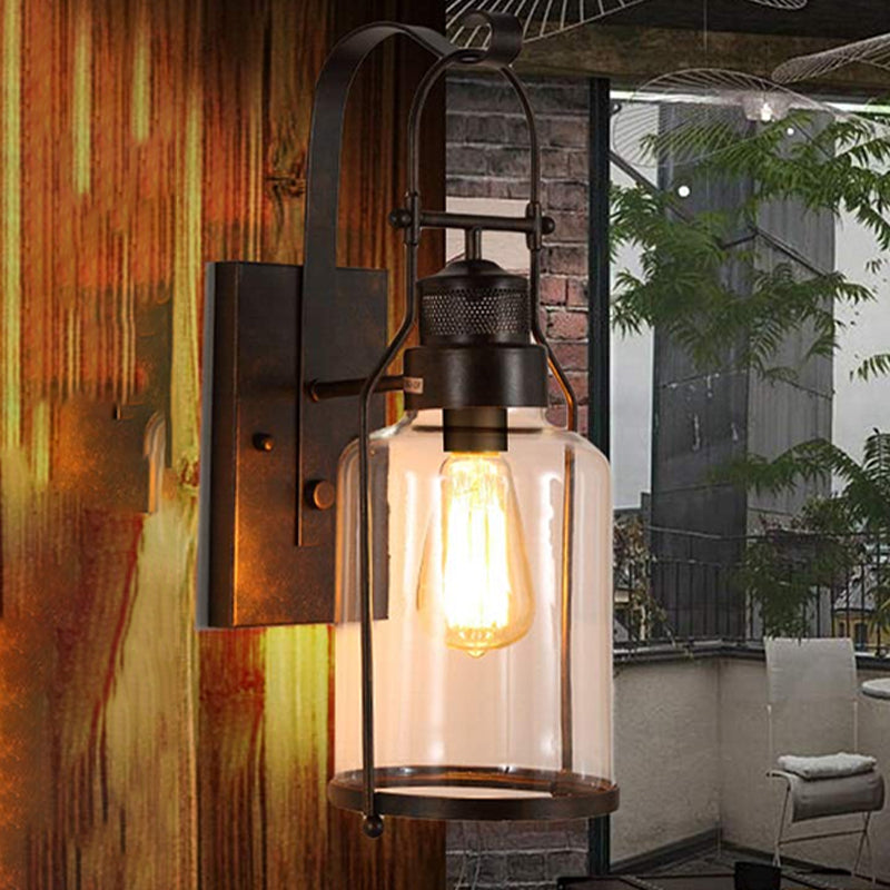 Cylinder Corridor Wall Light Fixture Industrial Clear Glass 1 Light Black Sconce Lamp with Cage Clearhalo 'Cast Iron' 'Glass' 'Industrial wall lights' 'Industrial' 'Middle century wall lights' 'Modern' 'Tiffany' 'Traditional wall lights' 'Wall Lamps & Sconces' 'Wall Lights' Lighting' 460768