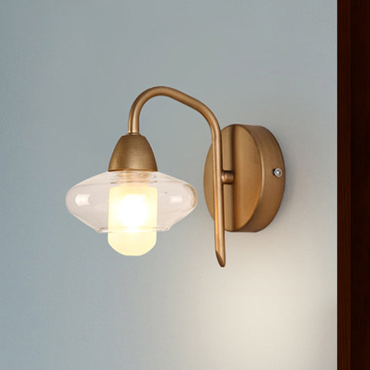 Brass Elliptical Sconce Lighting Modernist 1 Light Clear Glass Led Wall Mounted Light Clearhalo 'Cast Iron' 'Glass' 'Industrial' 'Modern wall lights' 'Modern' 'Tiffany' 'Traditional wall lights' 'Wall Lamps & Sconces' 'Wall Lights' Lighting' 466117