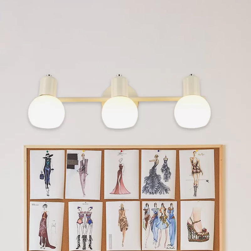 3-Bulb Wall Sconce Lighting with Bubble Shade Opal Glass Modern Bathroom Light Fixture in Black/White White Clearhalo 'Cast Iron' 'Glass' 'Industrial' 'Modern wall lights' 'Modern' 'Tiffany' 'Traditional wall lights' 'Wall Lamps & Sconces' 'Wall Lights' Lighting' 467609