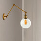 Brass One Light Sconce Light Vintage Clear Glass Spherical Lighting Fixture for Bedroom Clearhalo 'Art deco wall lights' 'Cast Iron' 'Glass' 'Industrial wall lights' 'Industrial' 'Middle century wall lights' 'Modern' 'Rustic wall lights' 'Tiffany' 'Traditional wall lights' 'Wall Lamps & Sconces' 'Wall Lights' Lighting' 468386