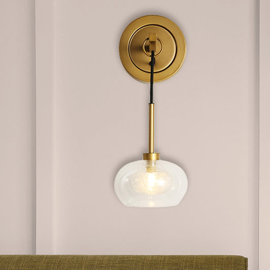 Oval Living Room Wall Light Fixture Industrial Clear Glass 1 Light Brass Sconce Lamp Clearhalo 'Cast Iron' 'Glass' 'Industrial' 'Modern wall lights' 'Modern' 'Tiffany' 'Traditional wall lights' 'Wall Lamps & Sconces' 'Wall Lights' Lighting' 468456
