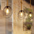 Metal Mussel Cage Suspension Light Industrial 1 Head Restaurant Hanging Pendant Lamp in Black with Knots Rope Cord Black Clearhalo 'Art Deco Pendants' 'Black' 'Cast Iron' 'Ceiling Lights' 'Ceramic' 'Crystal' 'Industrial Pendants' 'Industrial' 'Metal' 'Middle Century Pendants' 'Pendant Lights' 'Pendants' 'Rustic Pendants' 'Tiffany' Lighting' 493679