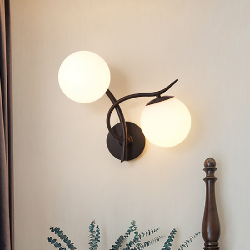 Modern Globe Wall Lighting Fixture 2 Bulbs Milky Glass Sconce Light in Black Clearhalo 'Cast Iron' 'Glass' 'Industrial' 'Modern wall lights' 'Modern' 'Tiffany' 'Traditional wall lights' 'Wall Lamps & Sconces' 'Wall Lights' Lighting' 493896