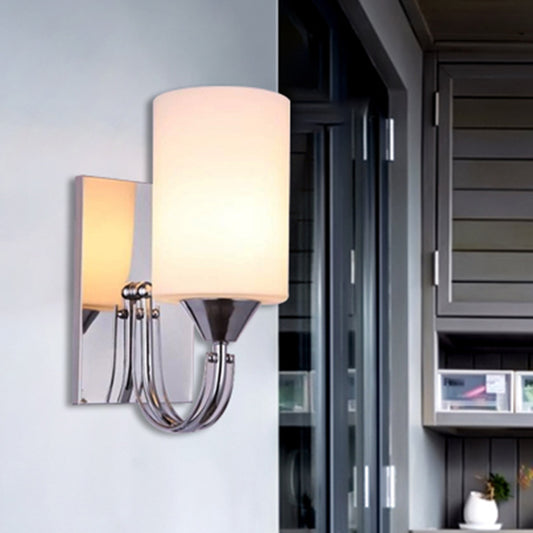 Silver Cylindrical Sconce Lighting Modernist 1 Light White Glass Wall Mounted Lamp with Curved Arm Clearhalo 'Cast Iron' 'Glass' 'Industrial' 'Modern wall lights' 'Modern' 'Tiffany' 'Traditional wall lights' 'Wall Lamps & Sconces' 'Wall Lights' Lighting' 494110