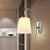 Bell Milk Glass Sconce Light Modernist 1 Light Chrome Wall Mounted Lamp with Curved Arm Chrome Clearhalo 'Cast Iron' 'Glass' 'Industrial' 'Modern wall lights' 'Modern' 'Tiffany' 'Traditional wall lights' 'Wall Lamps & Sconces' 'Wall Lights' Lighting' 494112