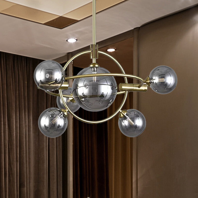 Gold Concentric Ring Pendant Light with Sphere Shade Amber/Clear/Smoke Glass Contemporary Chandelier for Living Room Clearhalo 'Ceiling Lights' 'Chandeliers' 'Clear' 'Glass shade' 'Glass' 'Industrial' 'Modern Chandeliers' 'Modern' 'Tiffany' 'Traditional Chandeliers' Lighting' 494324