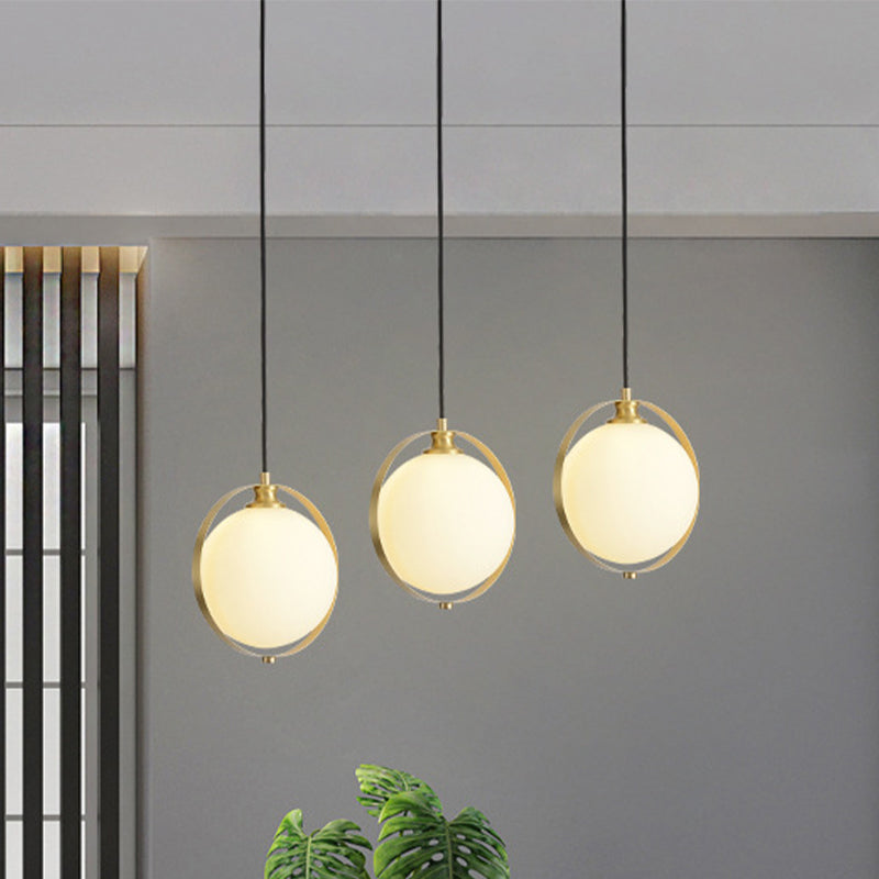 Opal Glass Ball Suspension Lighting Modern 3 Heads Cluster Pendant Lamp in Gold with Linear/Round Canopy Clearhalo 'Ceiling Lights' 'Glass shade' 'Glass' 'Modern Pendants' 'Modern' 'Pendant Lights' 'Pendants' Lighting' 512275