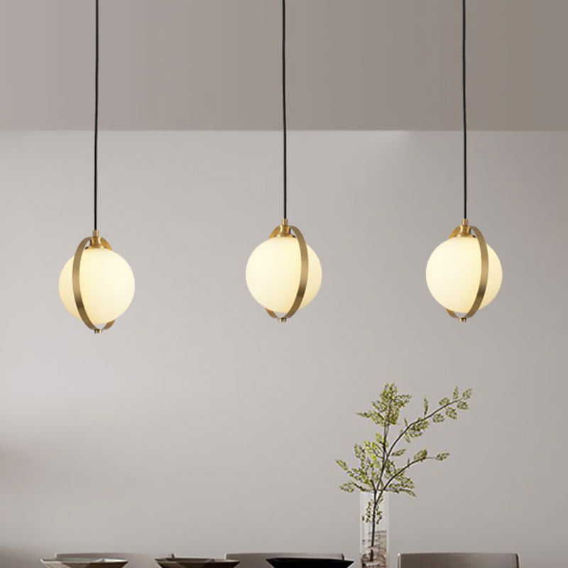 Opal Glass Ball Suspension Lighting Modern 3 Heads Cluster Pendant Lamp in Gold with Linear/Round Canopy Clearhalo 'Ceiling Lights' 'Glass shade' 'Glass' 'Modern Pendants' 'Modern' 'Pendant Lights' 'Pendants' Lighting' 512276
