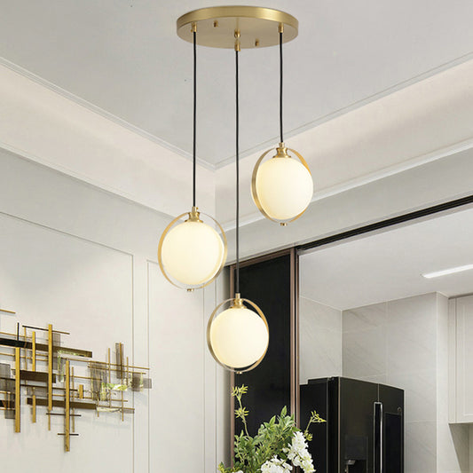 Opal Glass Ball Suspension Lighting Modern 3 Heads Cluster Pendant Lamp in Gold with Linear/Round Canopy Gold Round Clearhalo 'Ceiling Lights' 'Glass shade' 'Glass' 'Modern Pendants' 'Modern' 'Pendant Lights' 'Pendants' Lighting' 512279