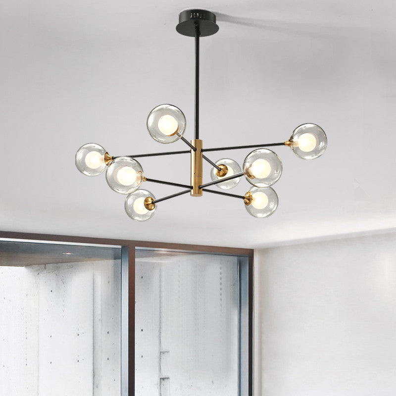 Ball Living Room Hanging Lighting Clear Glass 8-Light Modern Pendant Chandelier in Black and Gold with Sputnik Design Clearhalo 'Ceiling Lights' 'Chandeliers' 'Glass shade' 'Glass' 'Modern Chandeliers' 'Modern' Lighting' 512309