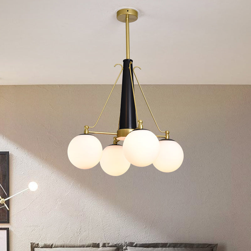 Sphere Frosted White Glass Pendant Modernism 4 Heads Brass and Black Hanging Chandelier Brass Clearhalo 'Ceiling Lights' 'Chandeliers' 'Glass shade' 'Glass' 'Modern Chandeliers' 'Modern' Lighting' 512347