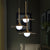 Iron Horn Shape Down Lighting Modernism 1 Head Ceiling Lamp Fixture in Brass with Orb Milk Glass Shade Brass Clearhalo 'Ceiling Lights' 'Glass shade' 'Glass' 'Modern Pendants' 'Modern' 'Pendant Lights' 'Pendants' Lighting' 519939
