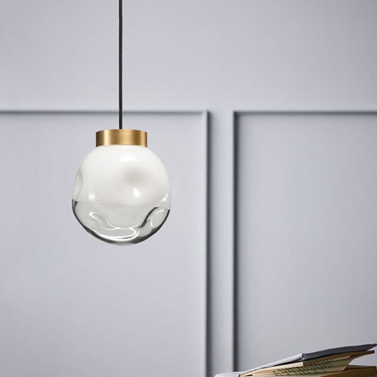 Modern Globe Hanging Lamp White and Clear Dimpled Glass 1-Head Bedside Pendant Ceiling Light in Brass White Clearhalo 'Ceiling Lights' 'Glass shade' 'Glass' 'Modern Pendants' 'Modern' 'Pendant Lights' 'Pendants' Lighting' 519973
