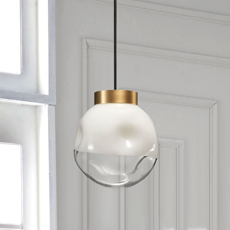 Modern Globe Hanging Lamp White and Clear Dimpled Glass 1-Head Bedside Pendant Ceiling Light in Brass Clearhalo 'Ceiling Lights' 'Glass shade' 'Glass' 'Modern Pendants' 'Modern' 'Pendant Lights' 'Pendants' Lighting' 519974