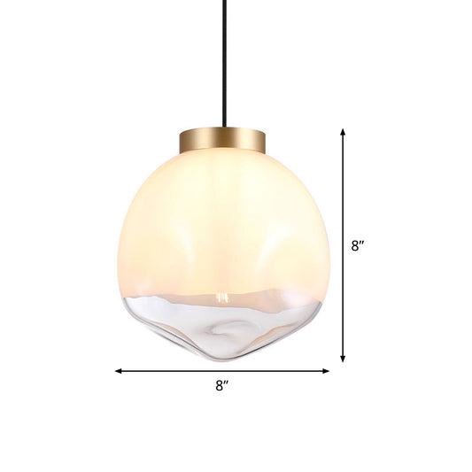 Modern Globe Hanging Lamp White and Clear Dimpled Glass 1-Head Bedside Pendant Ceiling Light in Brass Clearhalo 'Ceiling Lights' 'Glass shade' 'Glass' 'Modern Pendants' 'Modern' 'Pendant Lights' 'Pendants' Lighting' 519977