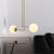 Simple Ball Multi Light Pendant White Glass 2 Heads Living Room Ceiling Lamp in Brass with Adjustable Node White Clearhalo 'Ceiling Lights' 'Glass shade' 'Glass' 'Modern Pendants' 'Modern' 'Pendant Lights' 'Pendants' Lighting' 520081