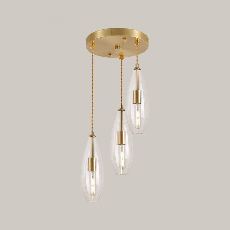 Brass Waterdrop Multi Light Pendant Modernist 3 Bulbs Clear Glass Suspension Lamp with Round Canopy Clearhalo 'Ceiling Lights' 'Chandeliers' 'Glass shade' 'Glass' 'Modern Pendants' 'Modern' 'Pendant Lights' 'Pendants' Lighting' 520104