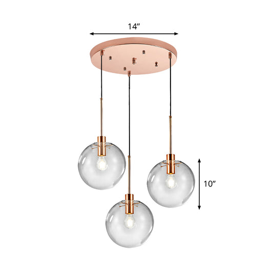 Rose Gold Round Cluster Pendant Light Minimalist 3-Bulb Clear Glass Ceiling Hang Fixture Clearhalo 'Ceiling Lights' 'Glass shade' 'Glass' 'Modern Pendants' 'Modern' 'Pendant Lights' 'Pendants' Lighting' 520180